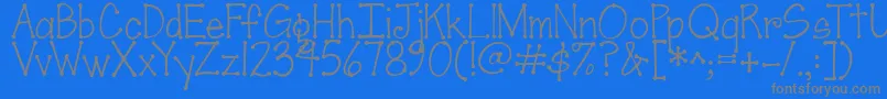 Jandascrapgirldots Font – Gray Fonts on Blue Background