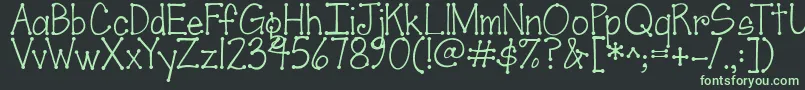 Czcionka Jandascrapgirldots – zielone czcionki na czarnym tle
