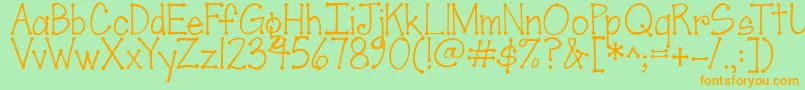 Fonte Jandascrapgirldots – fontes laranjas em um fundo verde