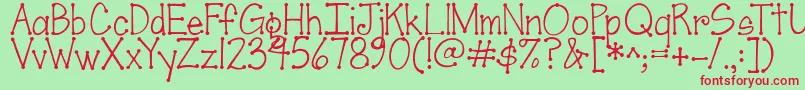 Jandascrapgirldots-fontti – punaiset fontit vihreällä taustalla