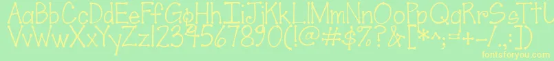 Шрифт Jandascrapgirldots – жёлтые шрифты на зелёном фоне