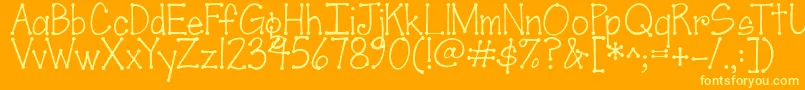 フォントJandascrapgirldots – オレンジの背景に黄色の文字