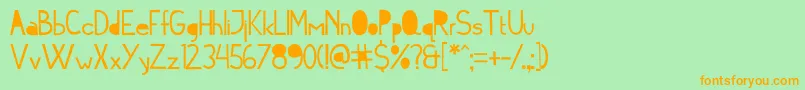 Cymof Font – Orange Fonts on Green Background