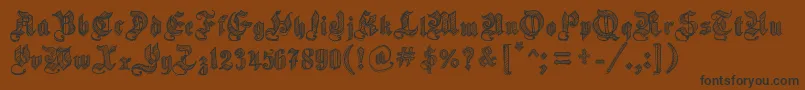 SketchGothicSchool-Schriftart – Schwarze Schriften auf braunem Hintergrund