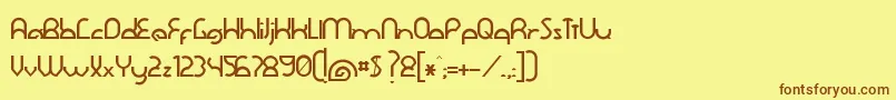 フォントDawnerBold – 茶色の文字が黄色の背景にあります。