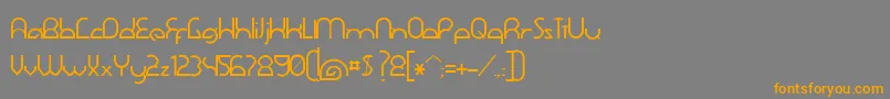 フォントDawner – オレンジの文字は灰色の背景にあります。