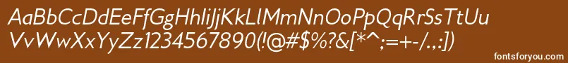 Gilliusadfno2Italic-fontti – valkoiset fontit ruskealla taustalla