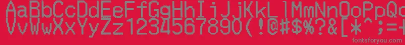 Fonte MerchantCopyDoublesize – fontes cinzas em um fundo vermelho