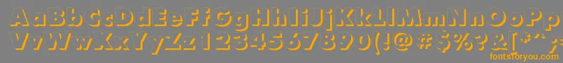 フォントFuturisxshadowcttRegular – オレンジの文字は灰色の背景にあります。