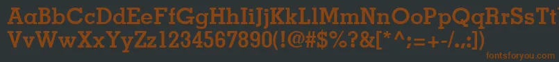 Шрифт JaakSsiBold – коричневые шрифты на чёрном фоне