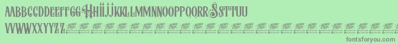 McfStoneheadDemo-fontti – harmaat kirjasimet vihreällä taustalla