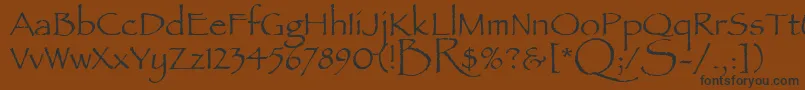 フォントPapyrusLetPlain.1.0 – 黒い文字が茶色の背景にあります