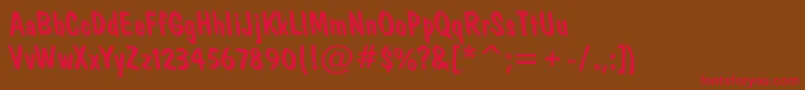 Dominoro Font – Red Fonts on Brown Background