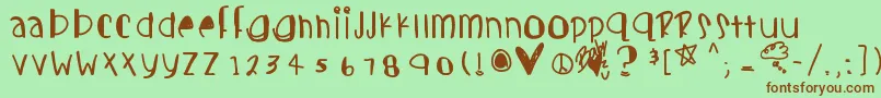 Candycutes Font – Brown Fonts on Green Background