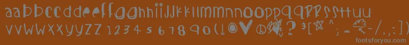 Candycutesフォントについての詳細 フォントCandycutes – 茶色の背景に灰色の文字