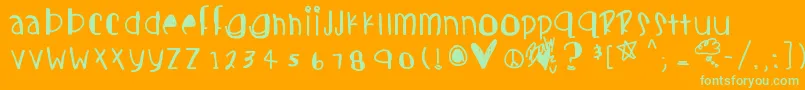 Candycutes-Schriftart – Grüne Schriften auf orangefarbenem Hintergrund