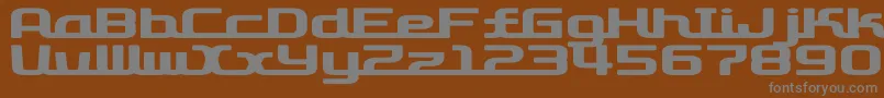 D3RoadsterismWide-fontti – harmaat kirjasimet ruskealla taustalla