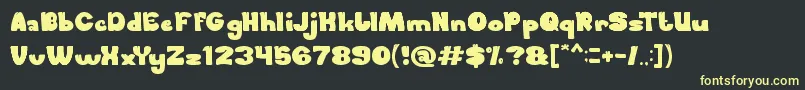 フォントForestThing – 黒い背景に黄色の文字