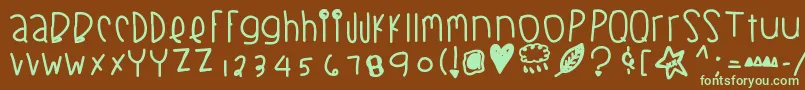 フォントBlackberrybluesthick – 緑色の文字が茶色の背景にあります。