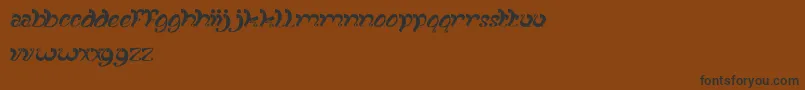 FancyCurly Font – Black Fonts on Brown Background