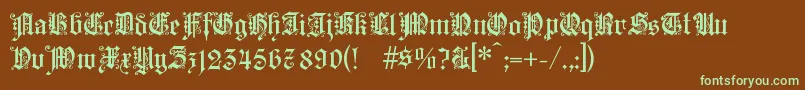 フォントKaisg – 緑色の文字が茶色の背景にあります。