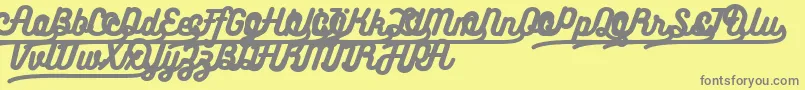 フォントBukhariscriptalternates – 黄色の背景に灰色の文字