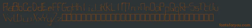 UgglyMonospaced Font – Brown Fonts on Black Background