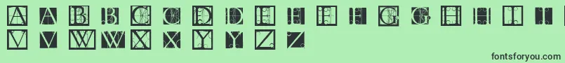 Tornielloinitials Font – Black Fonts on Green Background