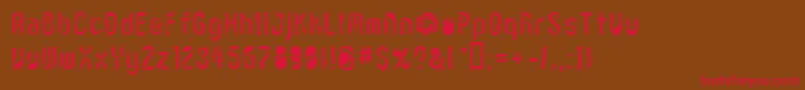 フォントLvdcr – 赤い文字が茶色の背景にあります。