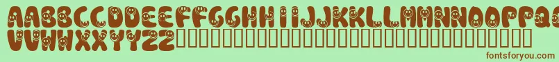 KrSmile Font – Brown Fonts on Green Background