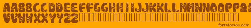 KrSmile-Schriftart – Braune Schriften auf orangefarbenem Hintergrund
