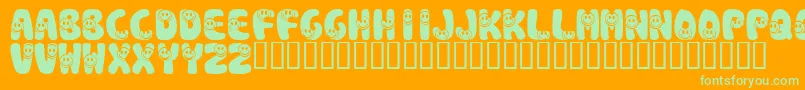 KrSmile-Schriftart – Grüne Schriften auf orangefarbenem Hintergrund