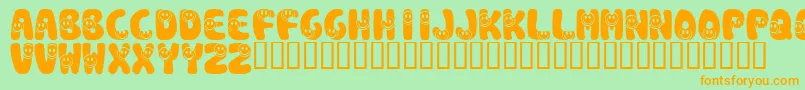KrSmile Font – Orange Fonts on Green Background