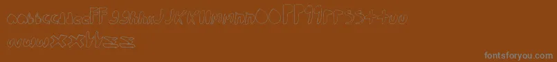 WalkTheWalk-Schriftart – Graue Schriften auf braunem Hintergrund