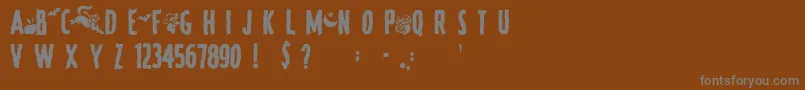 SpookyRegular Font – Gray Fonts on Brown Background