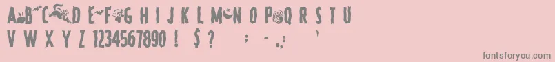 Fonte SpookyRegular – fontes cinzas em um fundo rosa