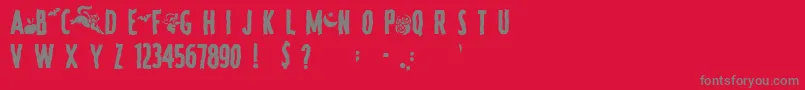 SpookyRegular-Schriftart – Graue Schriften auf rotem Hintergrund