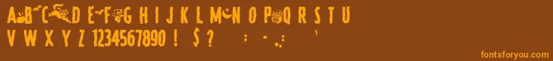 Fonte SpookyRegular – fontes laranjas em um fundo marrom