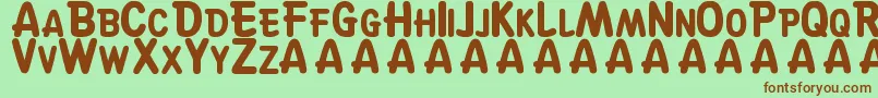 SuskeWiske Font – Brown Fonts on Green Background