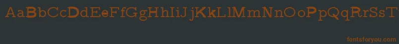 Czcionka CmVariablewidthtypewriterRegular – brązowe czcionki na czarnym tle