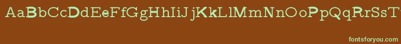 フォントCmVariablewidthtypewriterRegular – 緑色の文字が茶色の背景にあります。