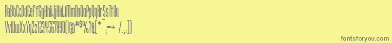 フォントNarrowbandprimeicg – 黄色の背景に灰色の文字