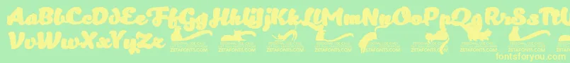 Kittenfattrial Font – Yellow Fonts on Green Background