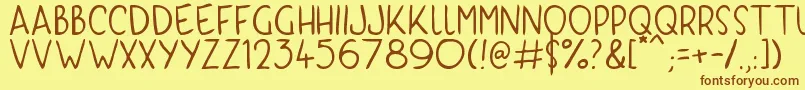 KyriKaps Font – Brown Fonts on Yellow Background