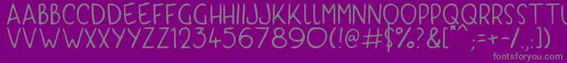 フォントKyriKaps – 紫の背景に灰色の文字