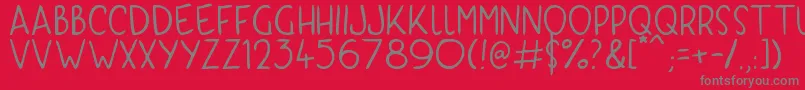 フォントKyriKaps – 赤い背景に灰色の文字