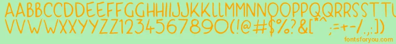 フォントKyriKaps – オレンジの文字が緑の背景にあります。