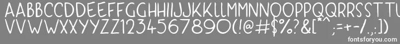 フォントKyriKaps – 灰色の背景に白い文字