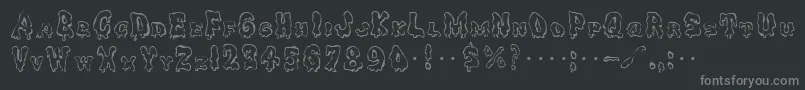 フォントGhoulycaps – 黒い背景に灰色の文字