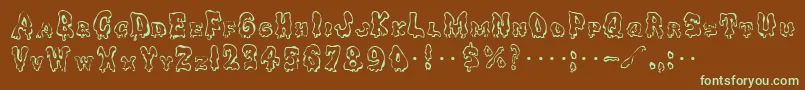 フォントGhoulycaps – 緑色の文字が茶色の背景にあります。